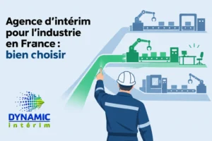 Un travailleur portant un casque de sécurité pointe vers une chaîne de production avec des machines et des bras robotiques